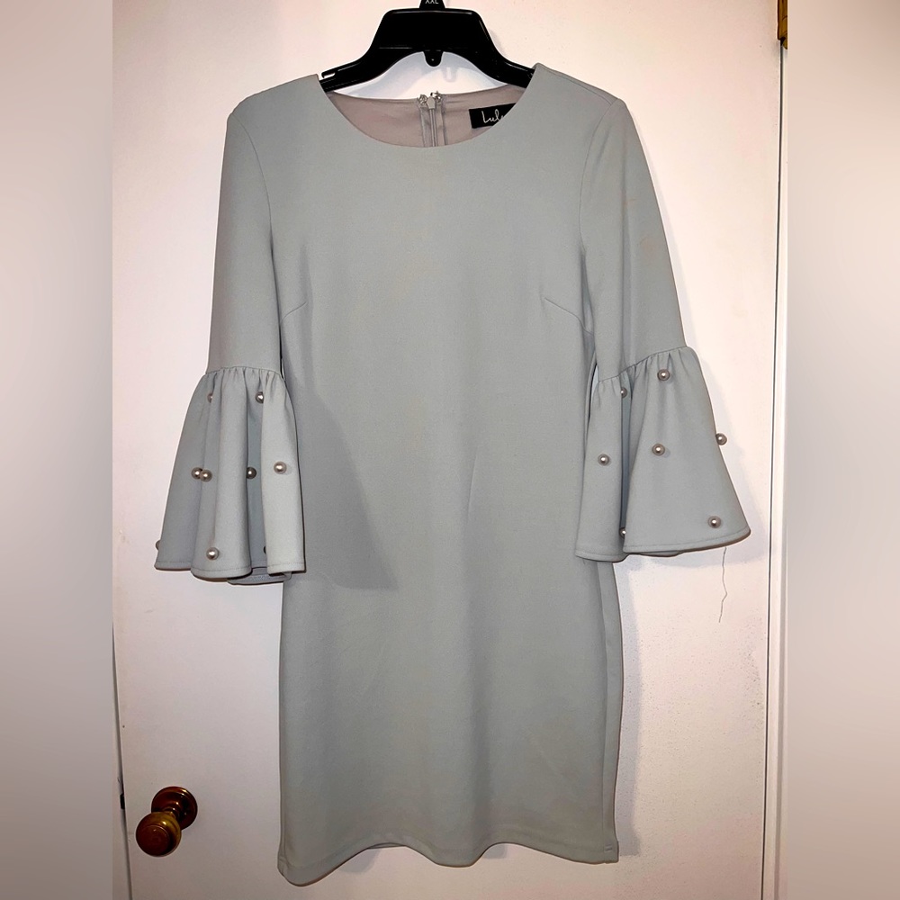 Green dress with statement sleeves